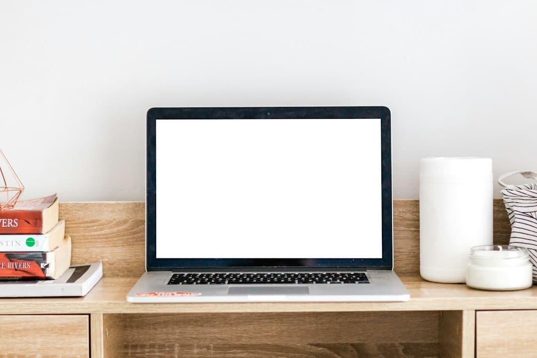 A modern therapy office with a laptop open on a desk, symbolizing accessible website design for therapists
