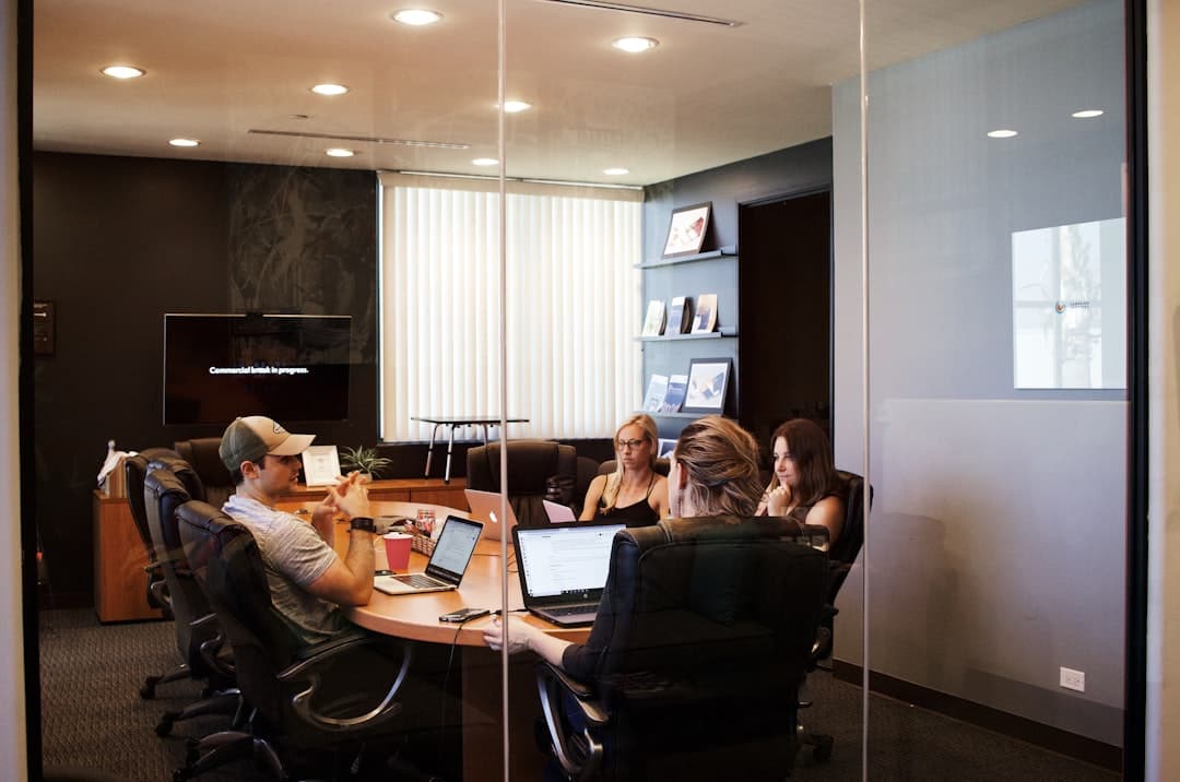 A diverse team of therapists collaborating on content strategy, highlighting the importance of teamwork in marketing.