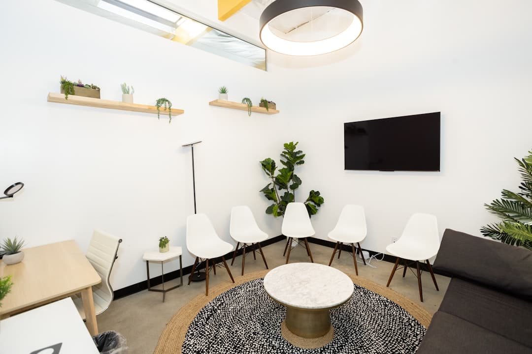 A welcoming therapy office with comfortable seating and calming decor, setting the tone for a positive intake process.