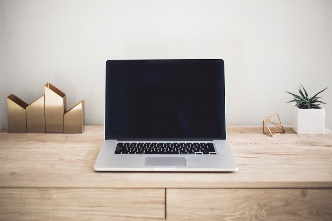 A therapist's office with a laptop open on a desk, symbolizing the use of email marketing in therapy practices.