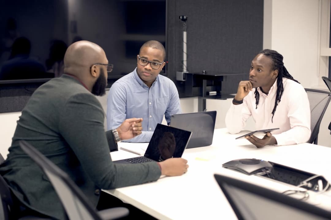 A diverse group of healthcare professionals discussing strategies, illustrating the importance of building referral channels.