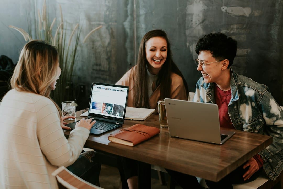 A group of professionals collaborating in a meeting room, reflecting teamwork in crafting a business plan.
