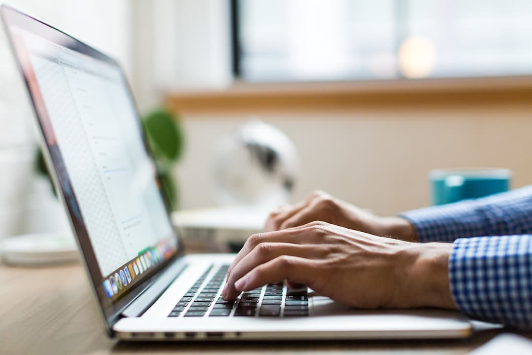 A calm therapy office with a laptop open on a desk, symbolizing the digital aspect of therapy practice website SEO.