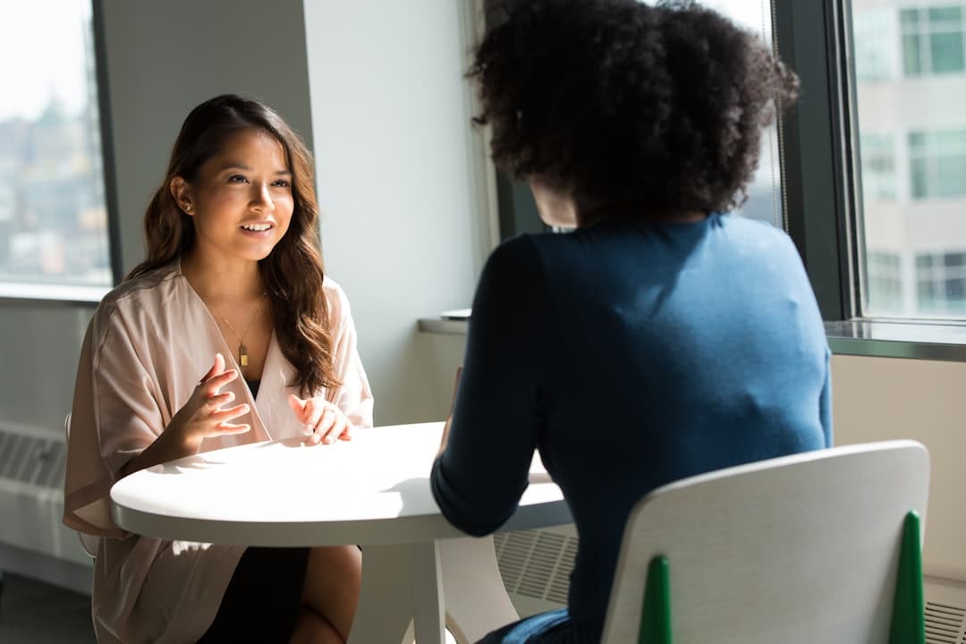 A consultant advising a therapist, highlighting the importance of leveraging practice consulting for fee setting